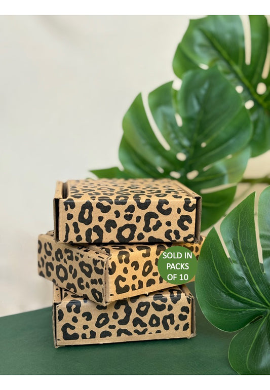 Leopard print boxes with a green leaf background