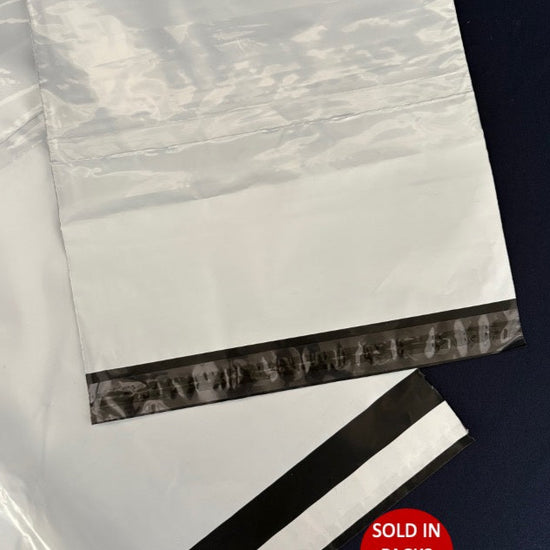 Clear plastic bags with black sealing strip on a dark background, sold in packs of 10.
