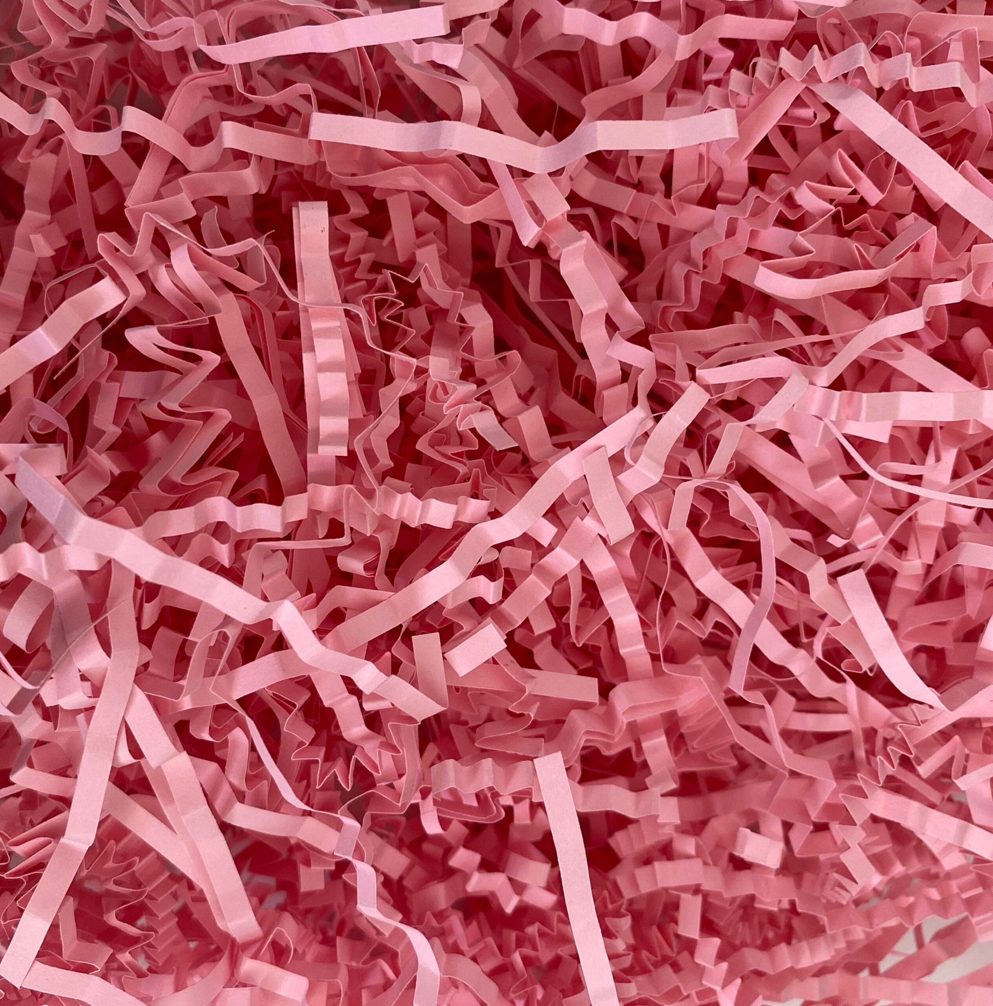 Pink crinkle shredded paper box filler 100 gram packet