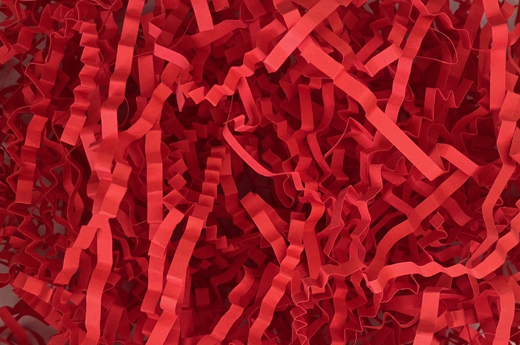 Red crinkle shredded paper box filler 100 gram packet 