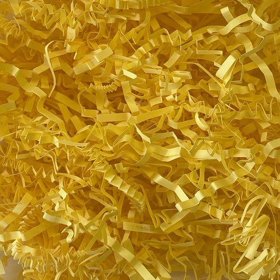 Yellow crinkle shredded paper box filler 100 gram packet
